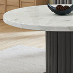Detail of the Valencia Dining Set's white faux marble tabletop with realistic veining, offering a luxurious and durable surface.