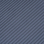 Close-up of blue corduroy fabric texture on the modular sofa. Soft ribbed material enhances comfort and adds a modern touch to living spaces.