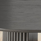 Detail of the gray oak wood grain tabletop and fluted base from the Valencia oval dining set, highlighting modern craftsmanship.