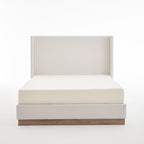 Hosford Minimalist Upholstered Wingback Bed.