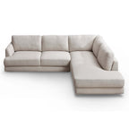 Mid-century modern cream linen sectional sofa with a right-facing chaise and clean, minimalist lines.