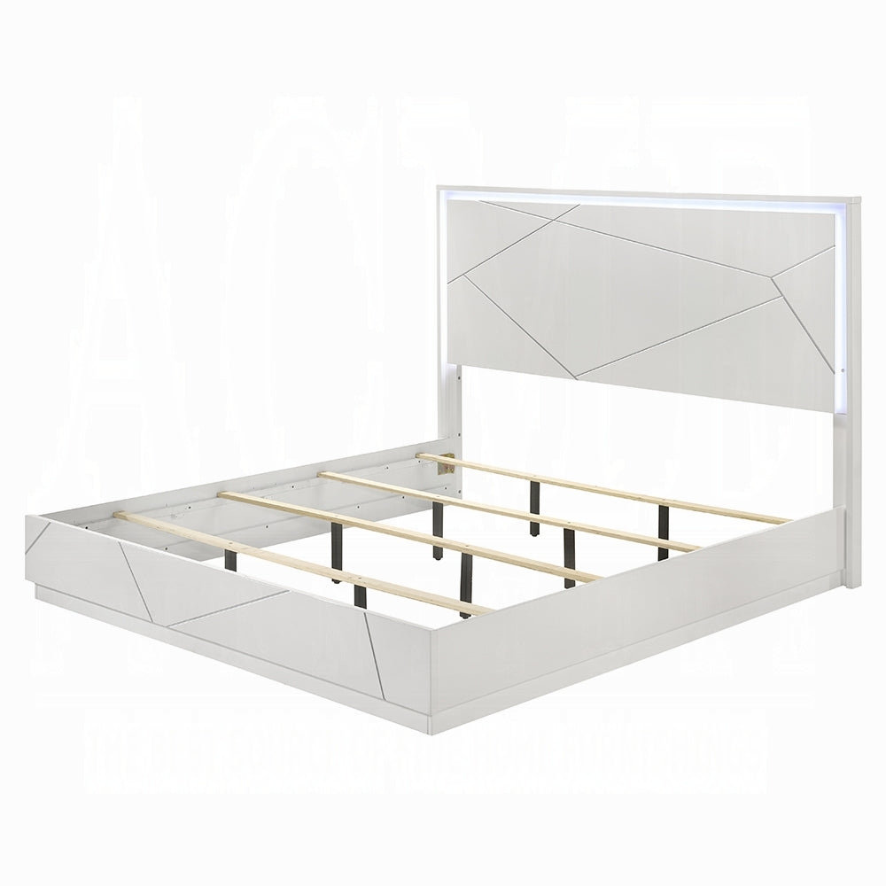 Modern white LED queen bed frame with geometric paneling and LED-lit headboard, shown without mattress for structural view.