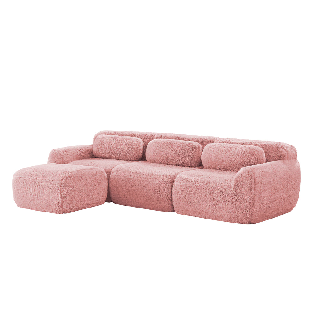 Ergonomic pink plush modular sofa with anti-slip base and movable ottoman, designed for comfort and modern living spaces.