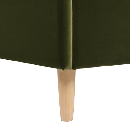 Detail of the olive green velvet corner and tapered wooden leg of the Stockholm Modern Wavy Headboard Platform Bed, queen size.