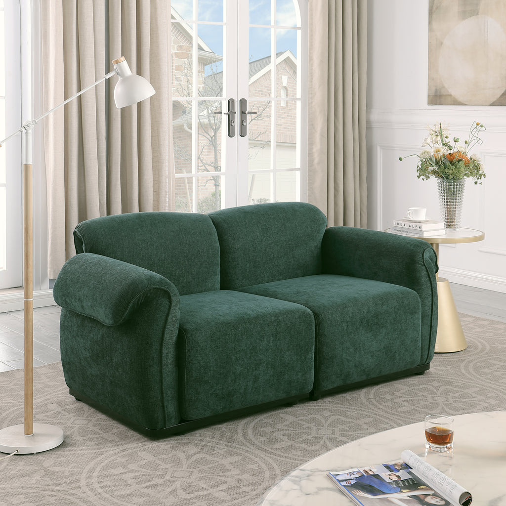 Forest green chenille modular sectional sofa with rounded arms and a sturdy iron frame, set in a modern living room.