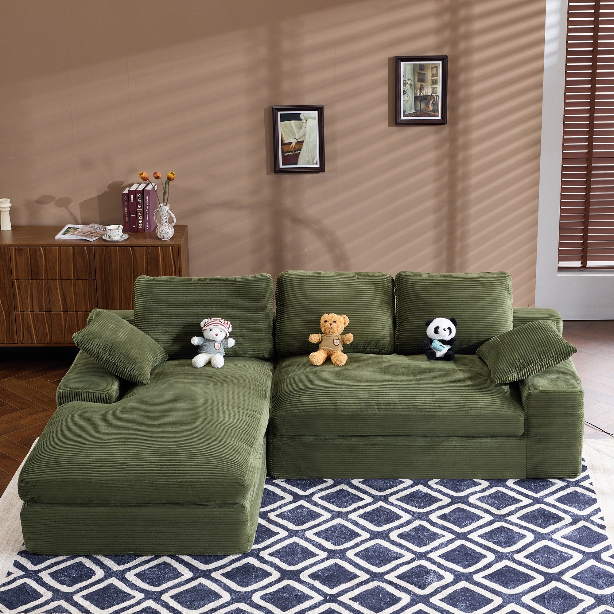 4-seat Green Corduroy Sofa with throw pillows and back cushions, perfect for modern interiors with warm tones and wood flooring.