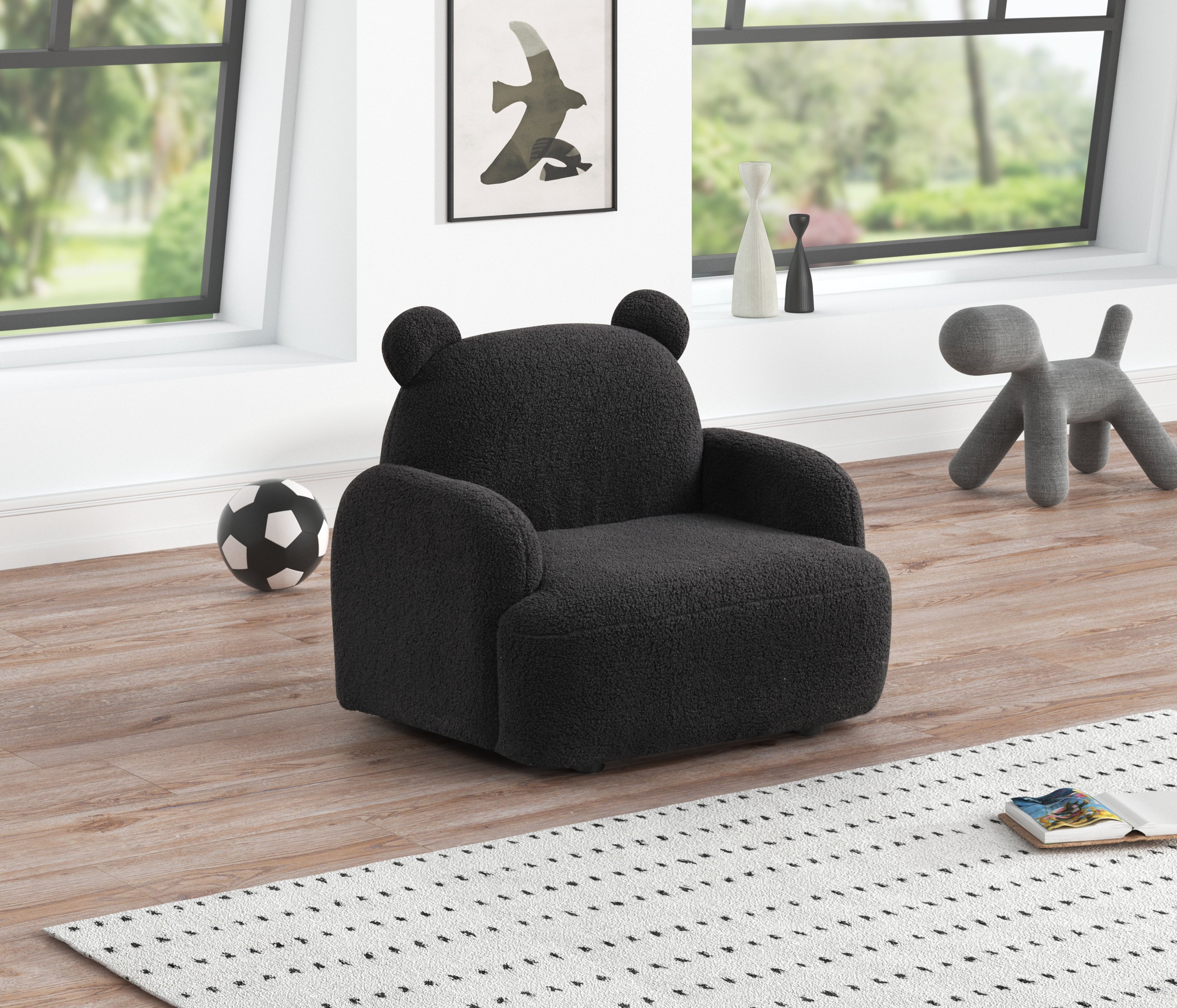 Black Sherpa Kids Armchair - Bear-Shaped in a modern playroom with soft foam padding and cute bear ears, ideal for reading or relaxing.