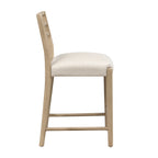 Side profile of ladder back counter stool showing plush seat cushion and angled backrest. Crafted for ergonomic support and style.