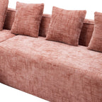 Side view of Pink Chenille L-Shaped Sofa featuring soft fabric texture and three backrest cushions for added support.