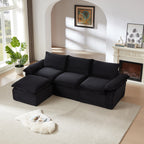 Three-seat modular corduroy sofa in black with chaise, placed in a bright modern living room. Perfect for stylish and adaptable home decor.