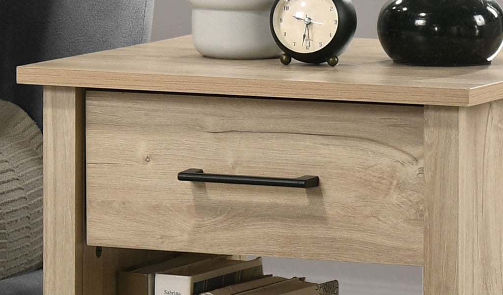 Drawer front of Light Oak Nightstand with Drawer - Celeste 20' featuring sleek black handle. Blends modern style with practical storage.
