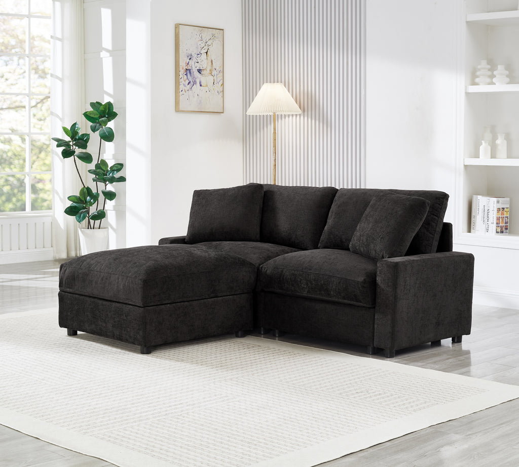 Modern black modular L-shaped sectional sofa in polyester fabric with plush cushions and a matching storage ottoman.