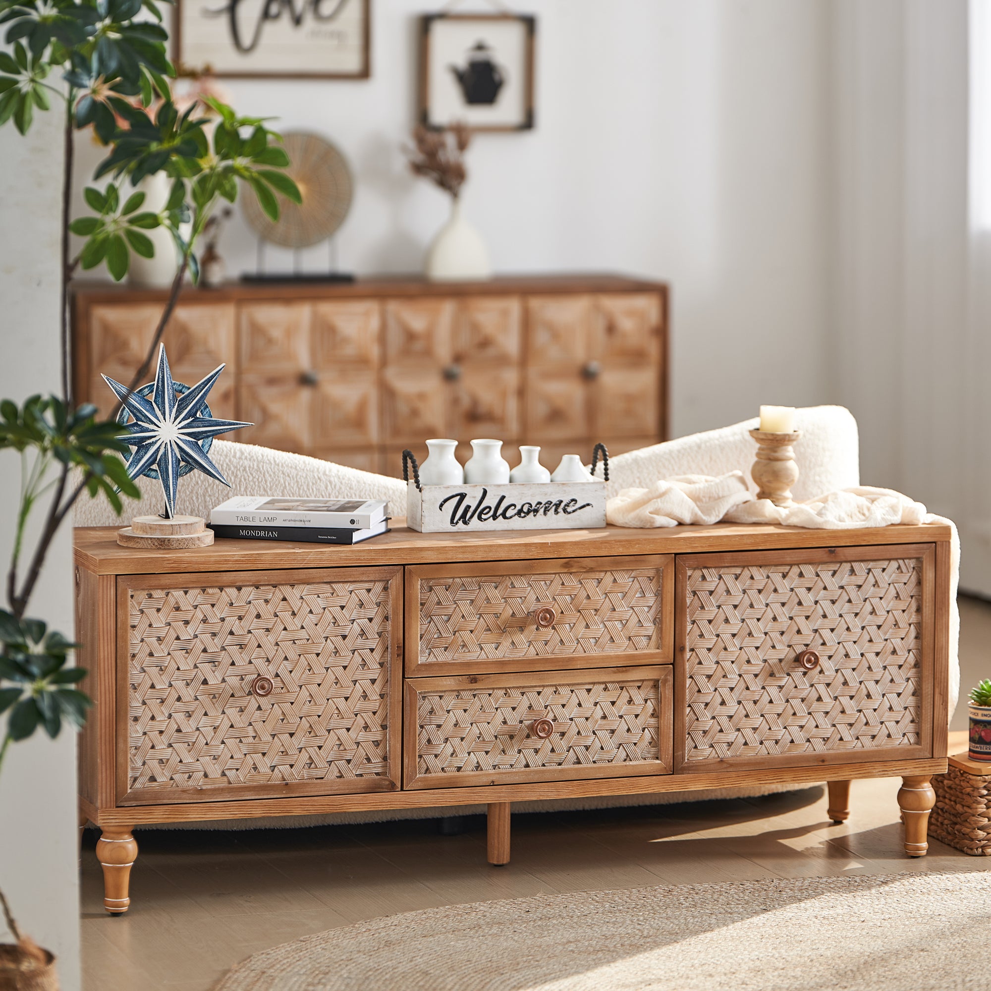 Boho Rattan TV Stand Mid Century with Storage styled in a cozy living room, ideal for 60-inch TVs and home decor.
