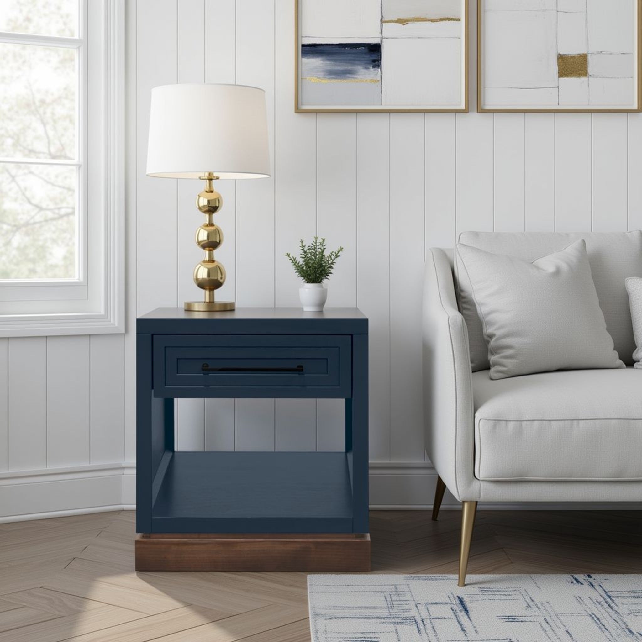 Nora 22 Inch End Table with Drawer and Shelf in Blue Denim and Whiskey finish beside a sofa, ideal for modern living rooms, no assembly required.