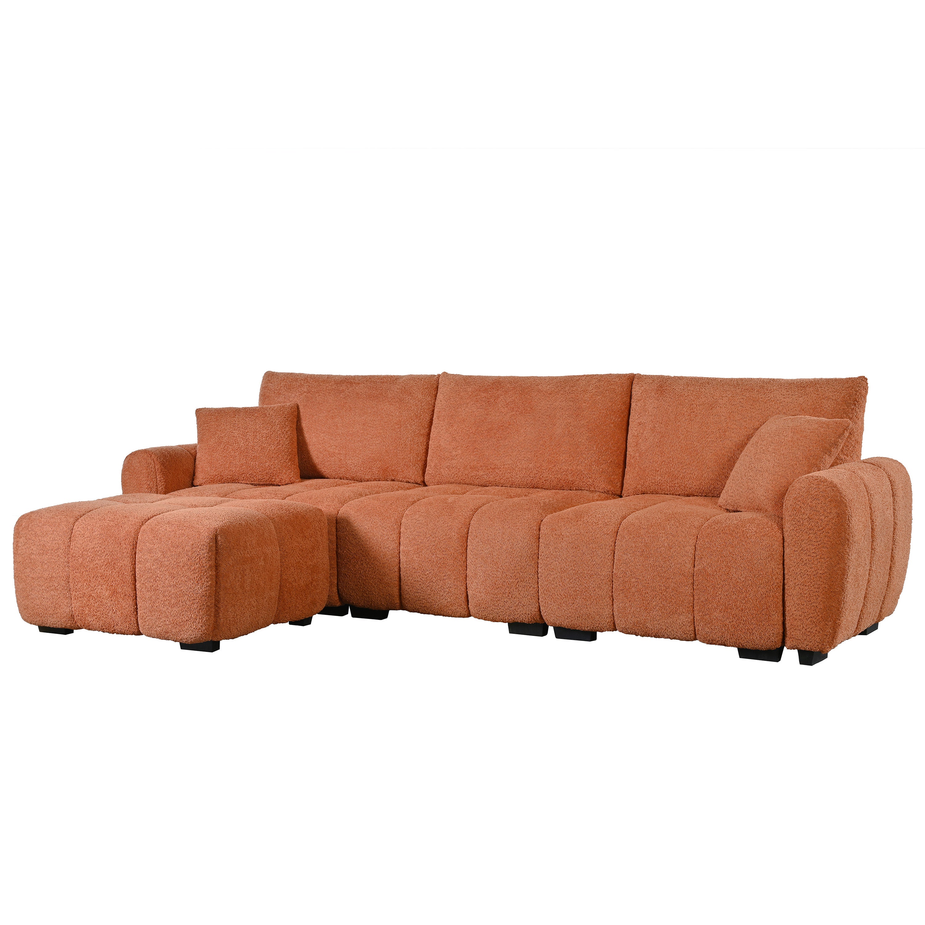 Angled side view of modular sectional sofa with ottoman in boucle fabric, showcasing thick cushions and contemporary design.