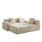 Angled view of modular corduroy sofa in cream with plush cushions. 114-inch sectional offers customizable seating without assembly.