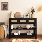 Single 43.3' console table in black with rattan drawers, styled with modern decor and books, perfect for farmhouse-inspired interiors.
