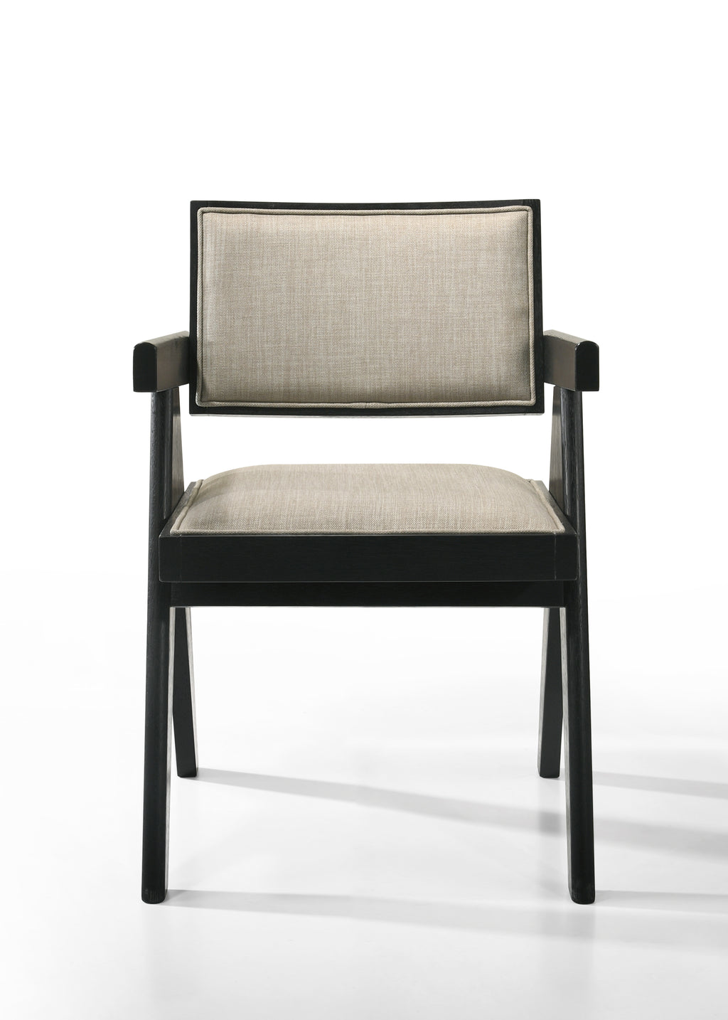 Front view of Jasper dining chair with beige fabric seat and backrest. Ebony black wood frame adds contrast and elegance.