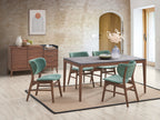 Modern walnut dining set with faux marble table and green upholstered chairs in a bright dining room. Ideal for stylish and durable home decor.