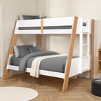 Stylish twin over full bunk bed with natural wood accents and side ladder, perfect for contemporary bedroom interiors.