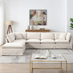 L-shaped modular sectional sofa with ottoman in a neutral-toned living room, designed for comfort and flexibility.