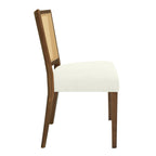 Side profile of mid-century dining chair showing thick cushioned seat and angled rattan backrest with solid wood legs.