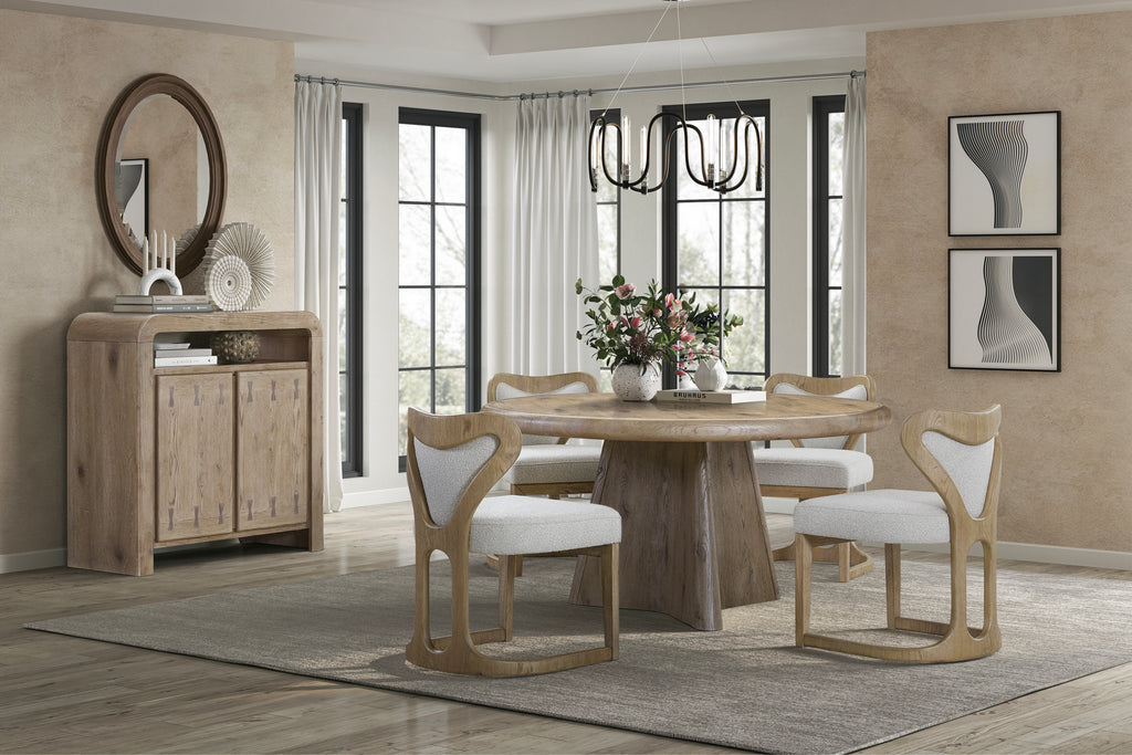Modern dining room with Wrap Design Chairs in English Knotty Oak, paired with a round wood table and neutral decor.