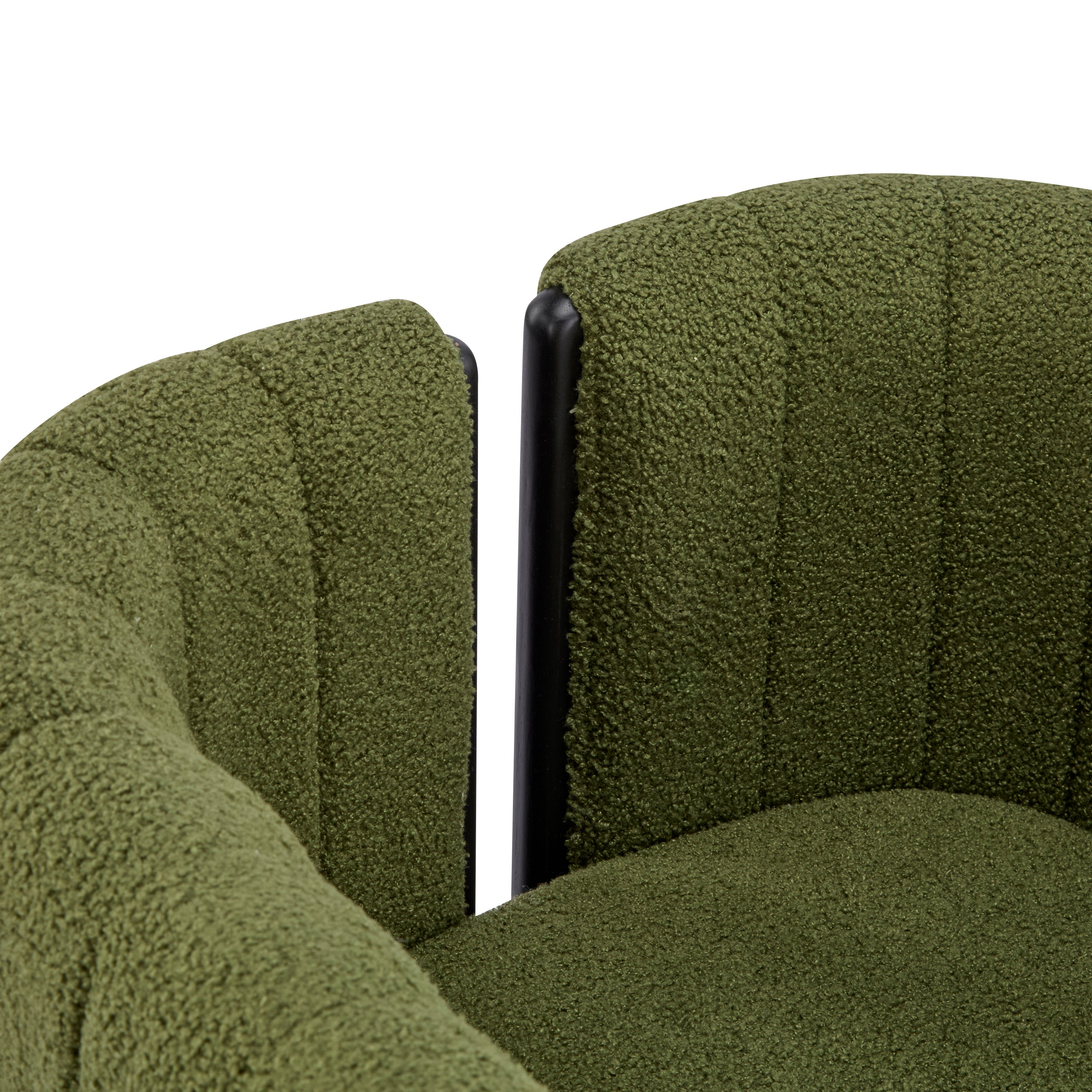 Detail of the backrest and armrest connection on a modern olive green dining chair with black wood frame.