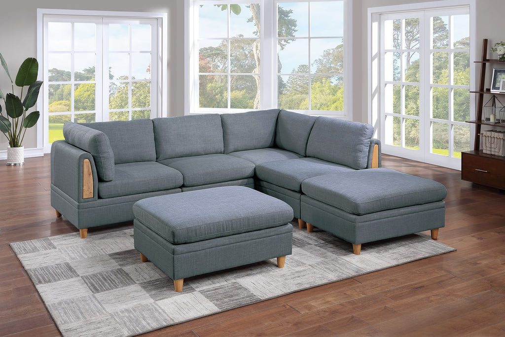 Contemporary steel-gray fabric 6-piece modular sectional with wedges, armless chairs, and ottomans on wooden legs.