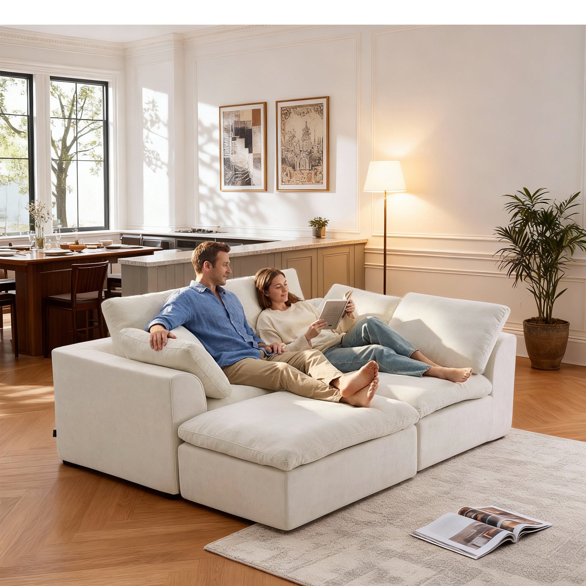 Couple lounging on L-Shaped Sectional Sofa with Chaise, showcasing deep seating and comfort for relaxing or reading in the living room.