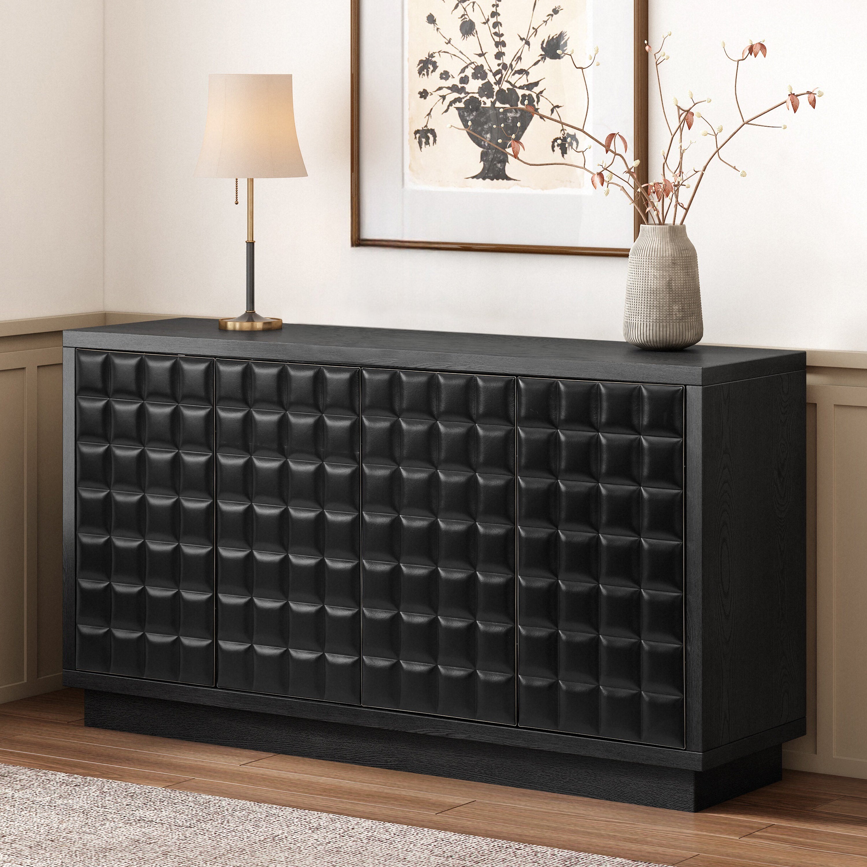 Black 4-Door Storage Cabinet featuring 3D geometric doors and sleek metal trim, placed in a contemporary home interior.