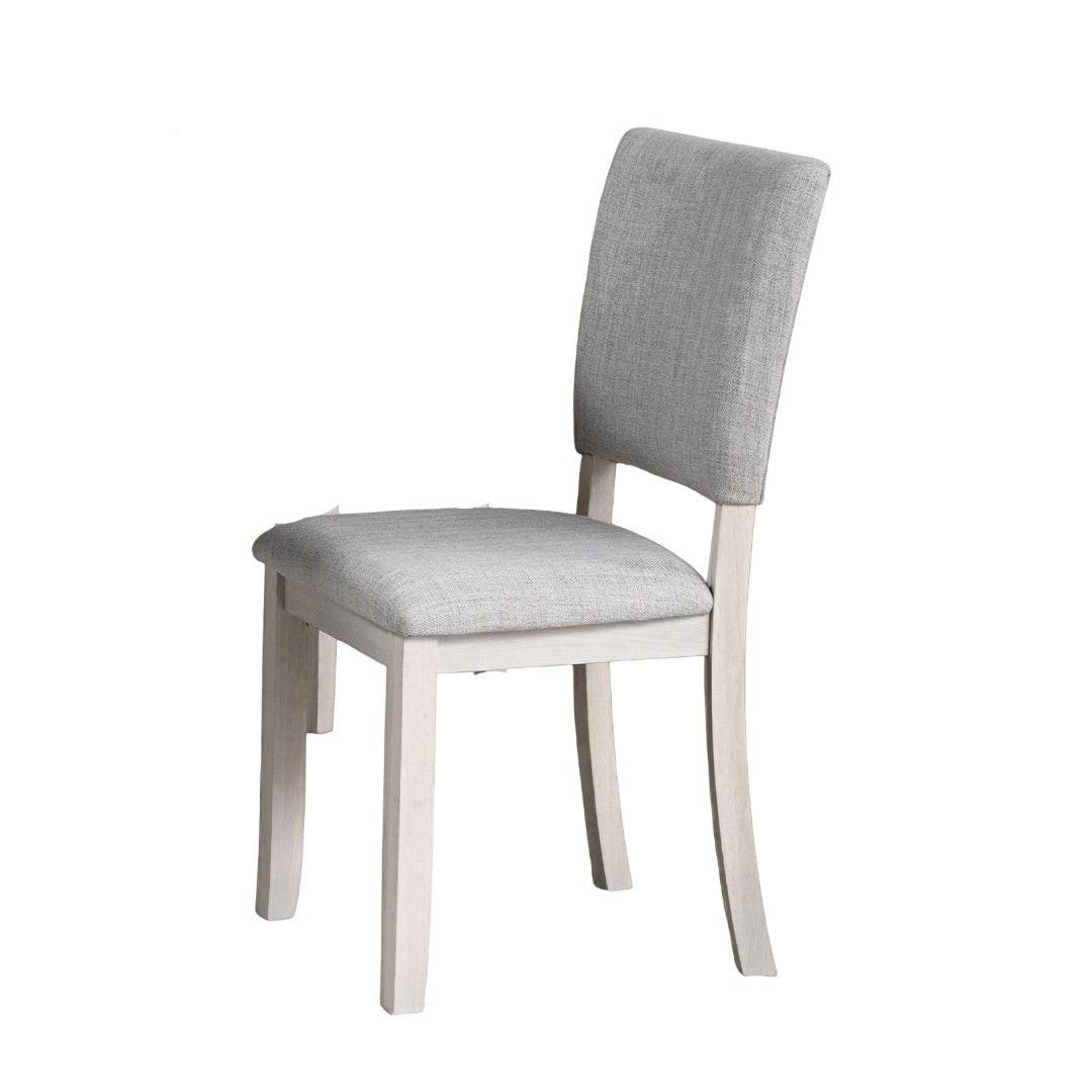 5pc dining set with gray upholstered chairs and round table.