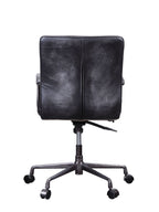 Barack Black Leather Chair - Office Seating rear view showing sleek leather backrest and sturdy aluminum base with height adjustment lever.