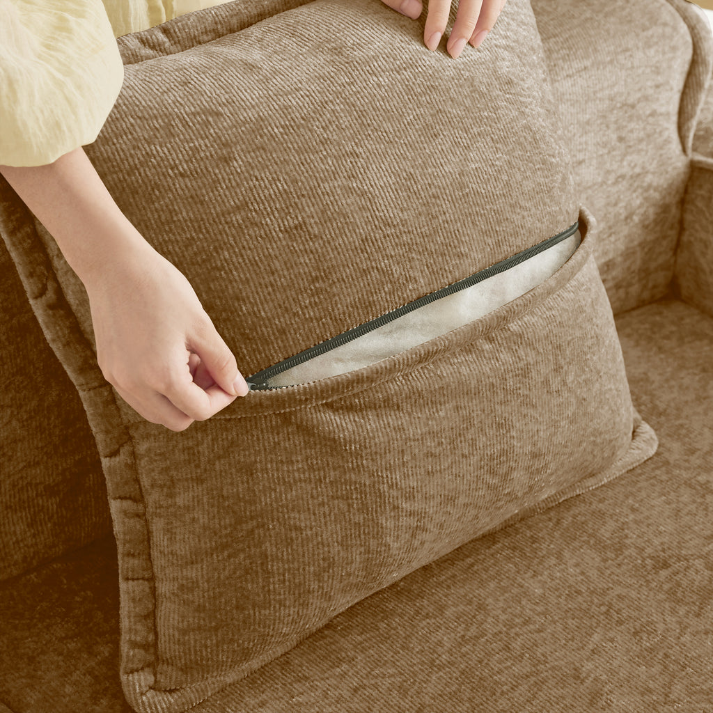Zippered pillow cover on Velvet Modular Sectional Sofa. Easy-to-remove and clean design for added convenience.