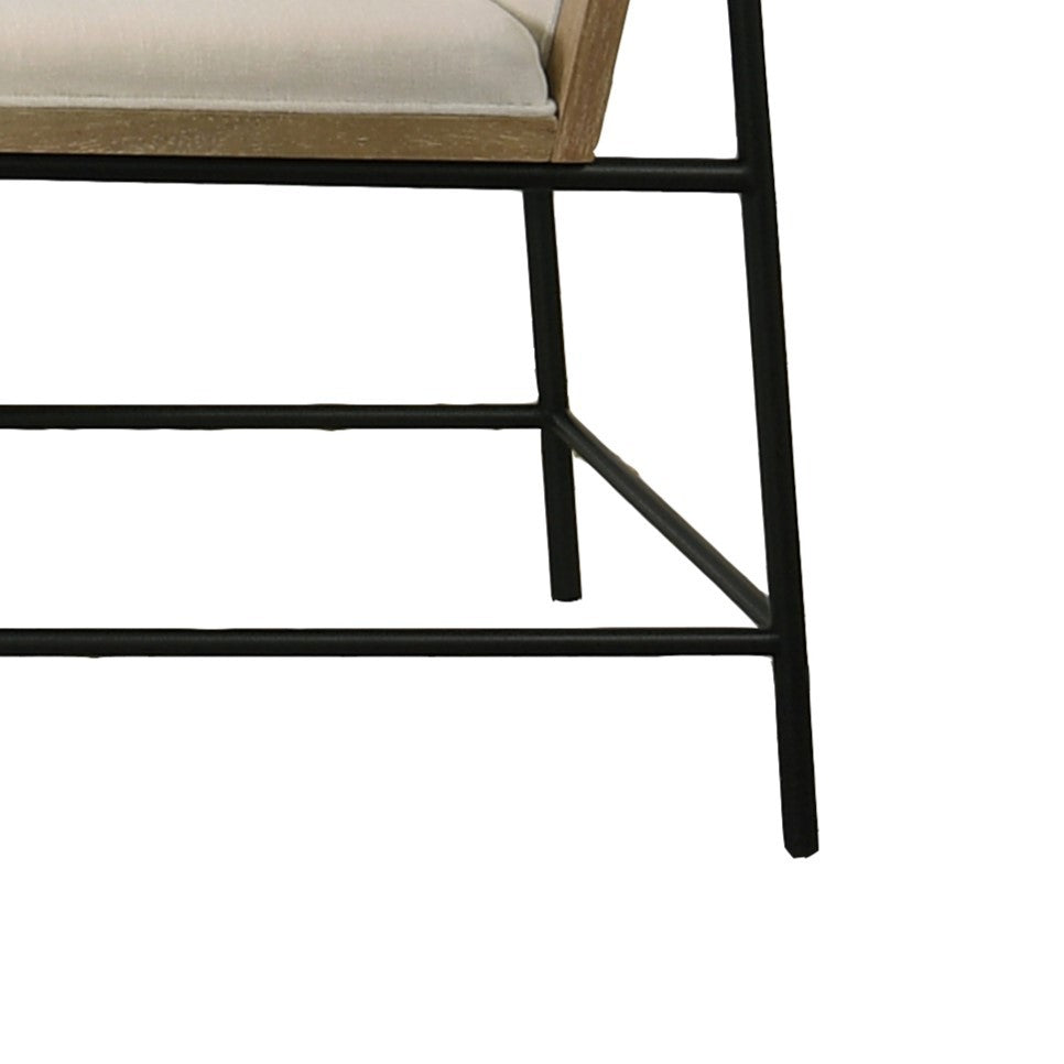 Lower frame detail of the dining chair showing black metal legs and oak seat base from the Round Oak Dining Table Set.