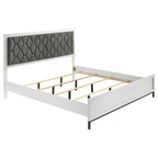 California King bed frame in white wood with dark gray diamond-tufted upholstered headboard and metal supports.
