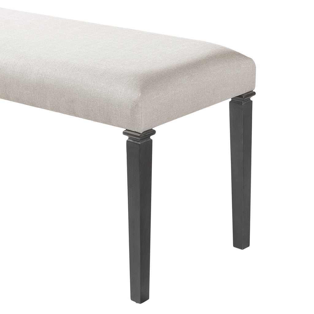 Close-up of retro dining bench corner showing beige fabric seat and detailed black wooden leg, part of 6-piece dining furniture set.