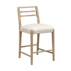 Angled view of ladder back counter stool with soft upholstered seat and sturdy wooden legs. Perfect for casual dining spaces.