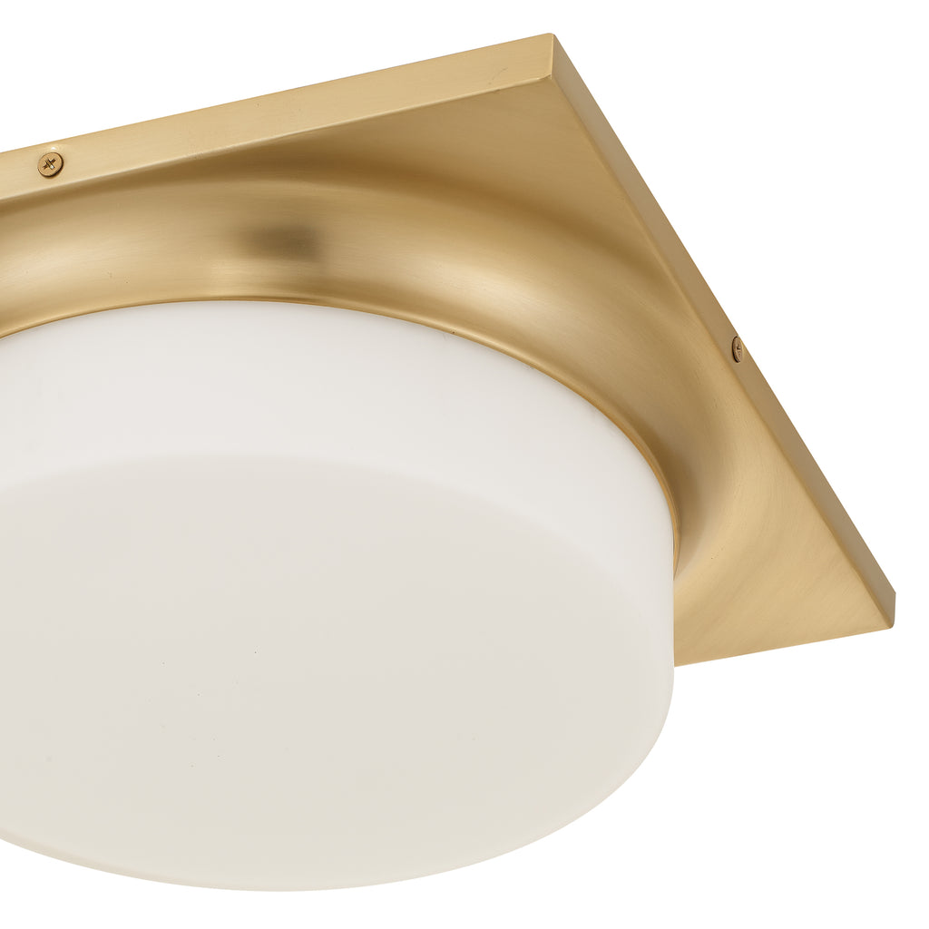 Detail view of Antique Brass LED Flush Mount showing brushed brass finish and smooth frosted lens for even light distribution.