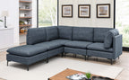 Modern navy blue linen modular sectional sofa with plush cushions and sleek black metal legs in a bright living room.