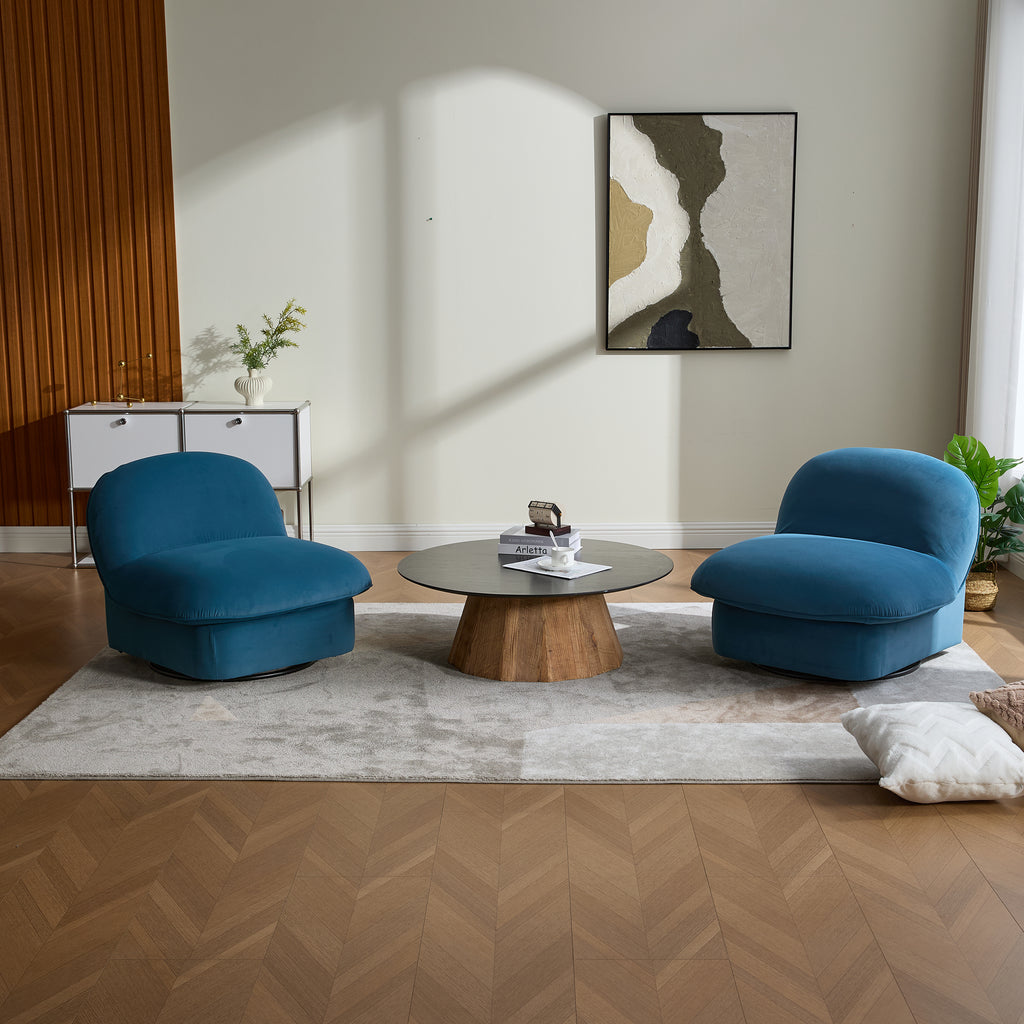 Modern living room with teal velvet swivel accent chairs and a round table, ideal for stylish and functional seating arrangements.