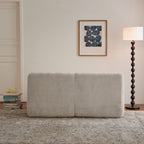 Back view of beige 2-seater memory foam sofa with smooth chenille fabric, designed for easy transport and no assembly required.