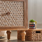 Close-up of boho rattan door texture and turned wooden legs on the Mid Century TV Stand with Storage for stylish interiors.