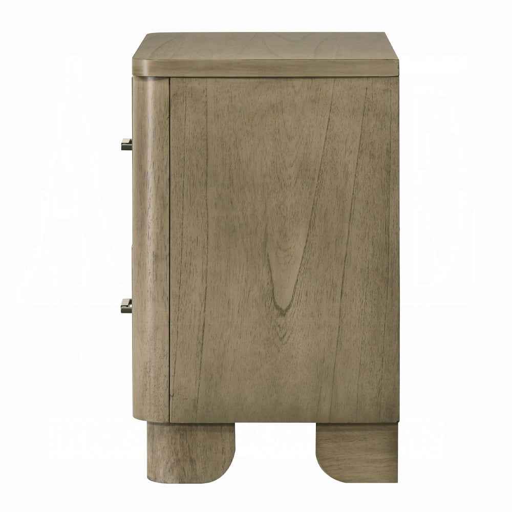 Side profile of transitional nightstand in antique oak. Smooth wood grain and curved edges highlight its rustic bedroom appeal.