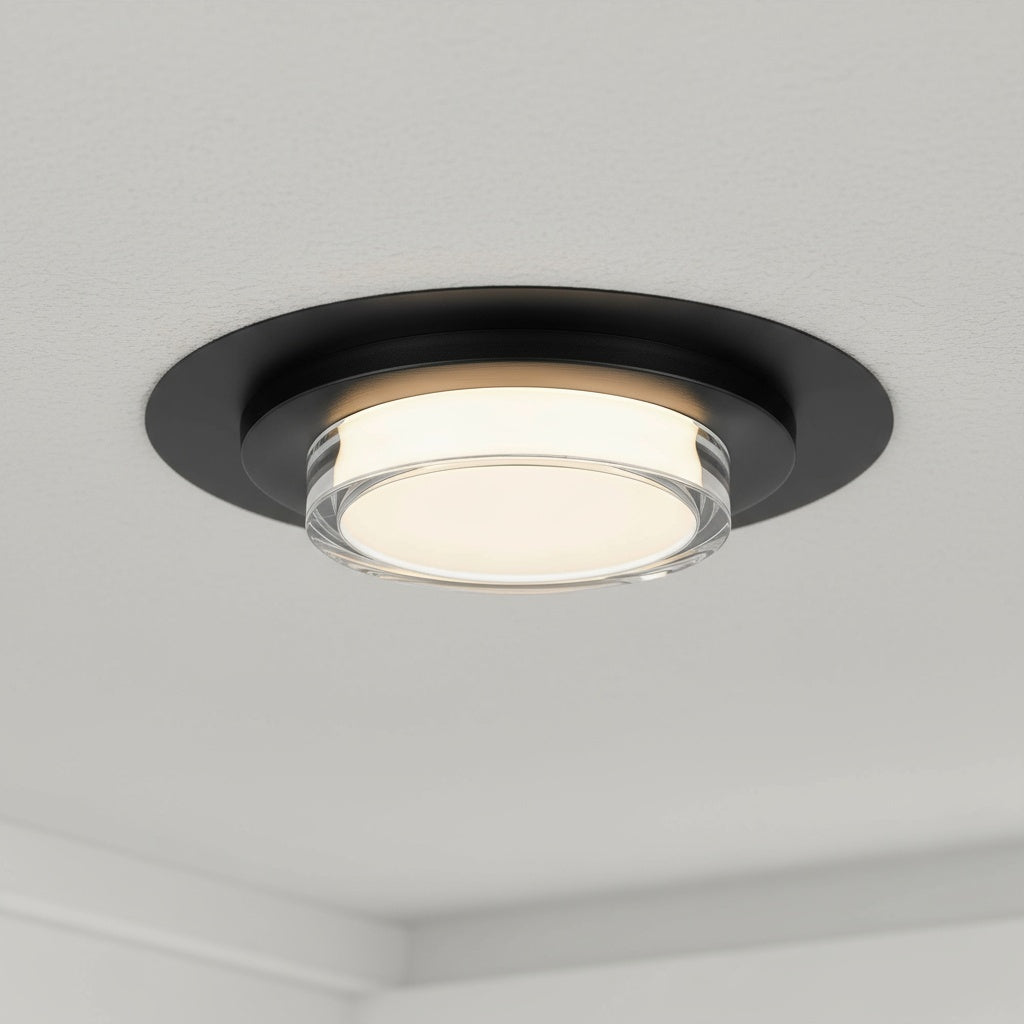 16 Inch LED Flush Mount Ceiling Fixture in black with integrated LED, installed on a white ceiling for modern ambient lighting.