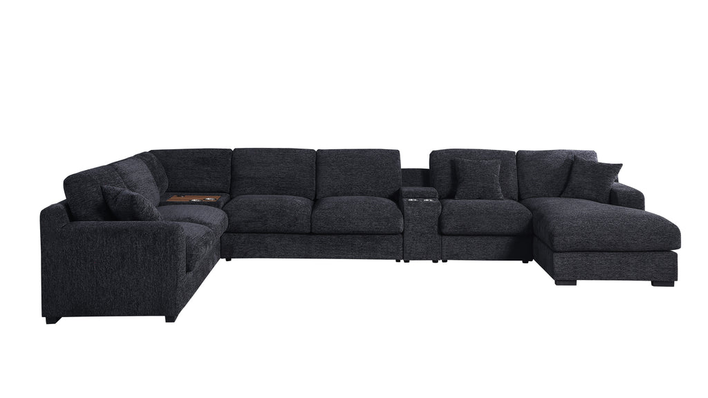Front view of Celine sectional sofa in dark gray with chaise, USB ports, and cupholders. Features plush cushions and modern design.