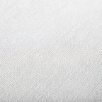 Close-up texture of the white fabric upholstery on rustic dining chairs, highlighting the soft, woven material used in the 2pc set.