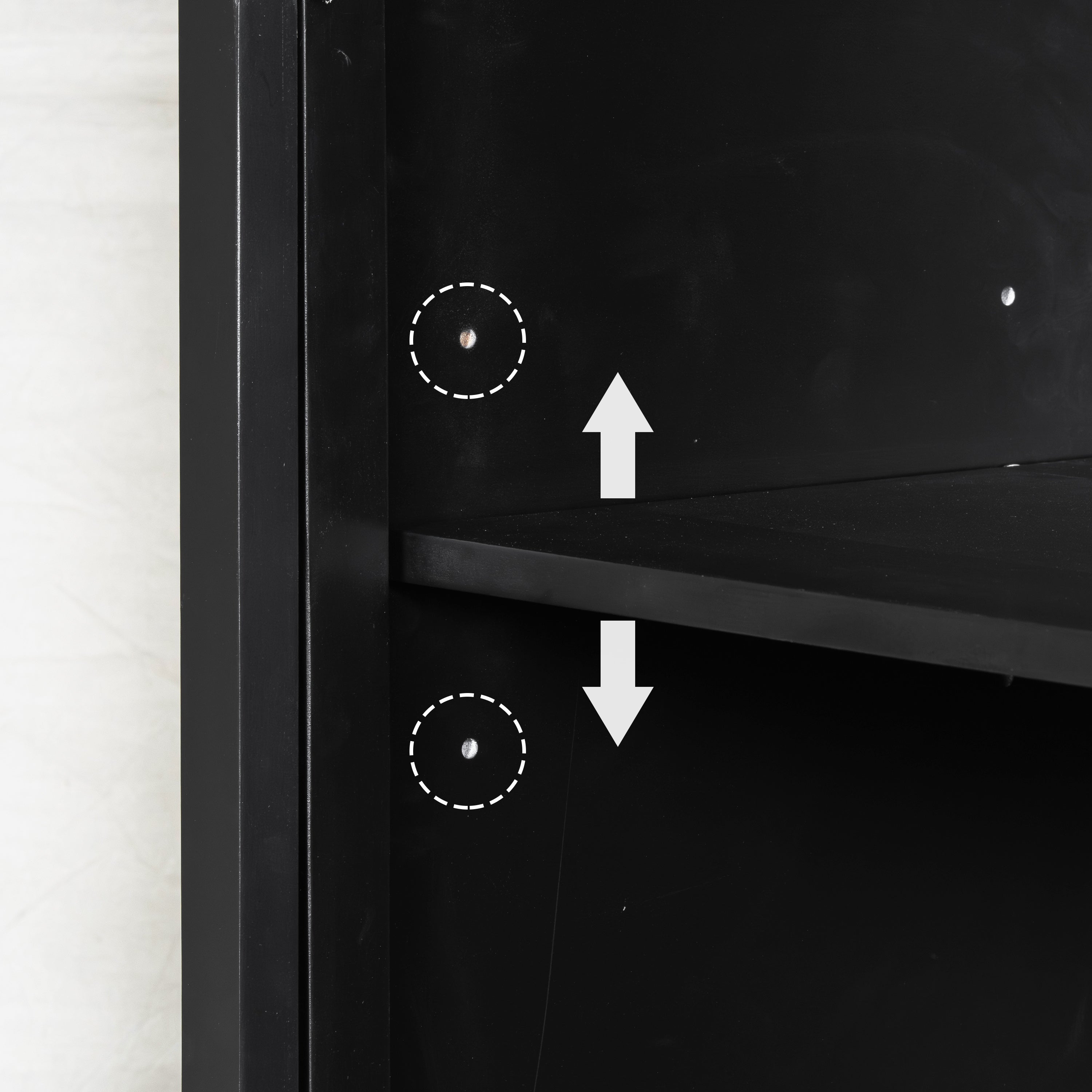 Interior view of black cabinet showing adjustable shelf mechanism with arrows and guide holes for custom storage height.