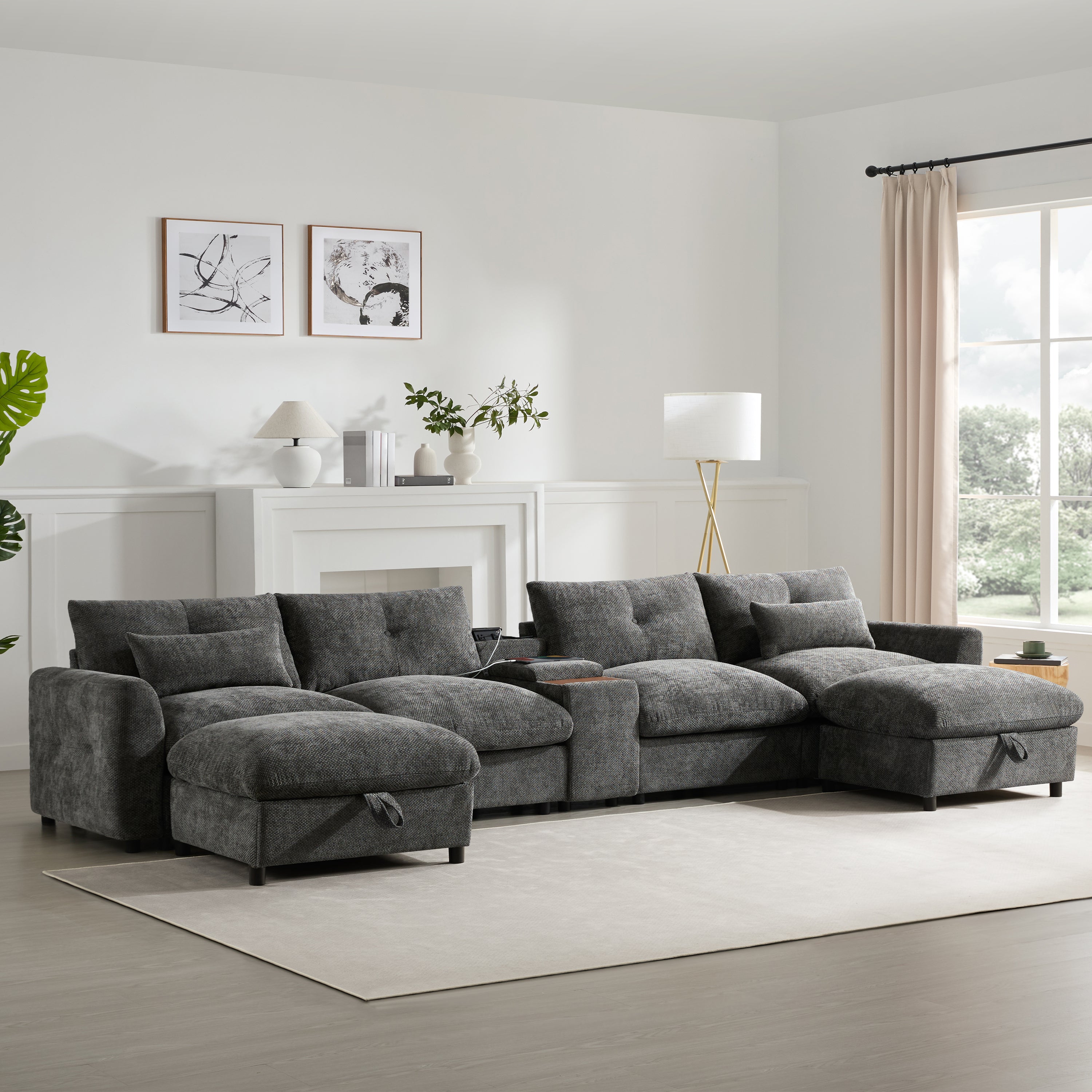 Oversized dark gray chenille U-shaped sectional with tufted cushions, console, cup holders, USB, and storage ottomans.