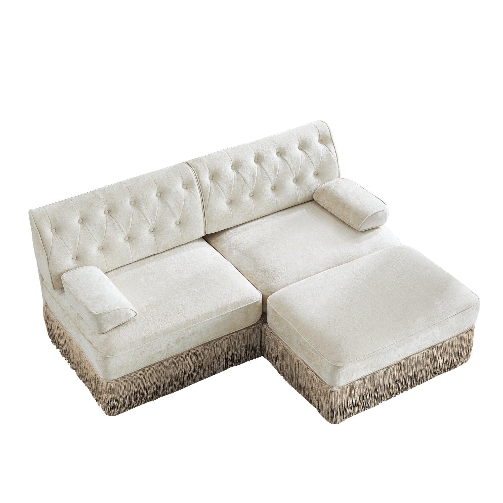 Modular Chesterfield Style Sofa with Tassel Skirt.
